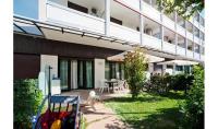 A garden outside Condominio Quadrangolo-Gemini