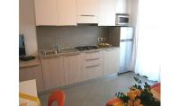 A kitchen or kitchenette at Condominio Quadrangolo-Gemini