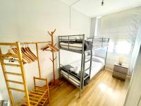 Postel nebo postele na pokoji v ubytování SeaHomes Vacations, FENALS BEACH&CHIC, pk, top apartment full equipped