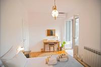 Posteľ alebo postele v izbe v ubytovaní Quartano Paros Residence