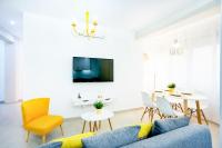 Televízia a/alebo spoločenská miestnosť v ubytovaní Alonso de Palencia City Center Apartment