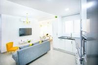 Televízia a/alebo spoločenská miestnosť v ubytovaní Alonso de Palencia City Center Apartment