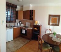 Kuchyňa alebo kuchynka v ubytovaní Beatrix Apartments