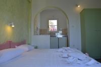 Posteľ alebo postele v izbe v ubytovaní Villas Georgy
