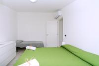 A bed or beds in a room at Brezza dell'Alento