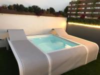 Posteľ alebo postele v izbe v ubytovaní DreamsApt Plaza Nueva