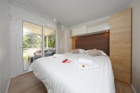 Posteľ alebo postele v izbe v ubytovaní ESTRADA mobile home