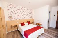 Postel nebo postele na pokoji v ubytování Hotel Apartamentos Villa Gomera