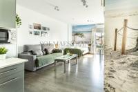 Posedenie v ubytovaní Atarazanas Apartment by Sol Maestranza