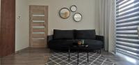 Posedenie v ubytovaní Apartament "Nad dachami"