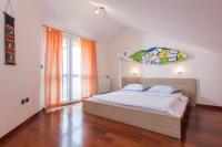 Posteľ alebo postele v izbe v ubytovaní Apartments Tino
