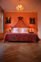 Postel nebo postele na pokoji v ubytování Boutique Hotel Museumkwartier