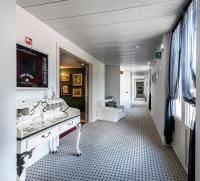 Televízia a/alebo spoločenská miestnosť v ubytovaní Hotel Il Corazziere