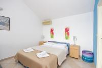 Posteľ alebo postele v izbe v ubytovaní Studio apartment in Pisak with sea view, terrace, air conditioning, WiFi 153-30