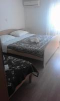 Postel nebo postele na pokoji v ubytování Apartments IVAN in Duce (900)