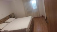 Postel nebo postele na pokoji v ubytování Apartments IVAN in Duce (900)