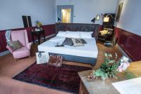 A bed or beds in a room at Soprarno Suites