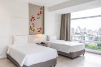 ジャスミン 59 ホテル バンコク (Jasmine 59 Hotel Bangkok)にあるベッド