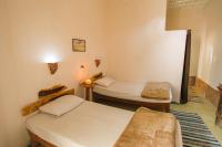 Postel nebo postele na pokoji v ubytování Seliyaa Siwa Inn Hotel