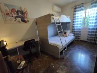 A bed or beds in a room at Villa Coco