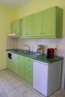 Kuchyň nebo kuchyňský kout v ubytování Tzaneria Apartments Skiathos