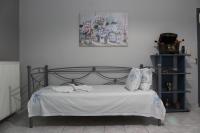 Postel nebo postele na pokoji v ubytování Tzaneria Apartments Skiathos