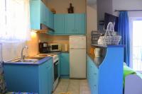 Kuchyň nebo kuchyňský kout v ubytování Tzaneria Apartments Skiathos