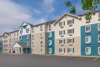 una representación del frente de un edificio en WoodSpring Suites Harlingen, en Harlingen