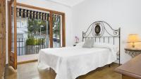 A bed or beds in a room at 1 Brav - Llafranc