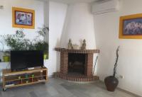 TV a/nebo společenská místnost v ubytování Villa Andaluza