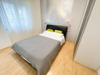 Posteľ alebo postele v izbe v ubytovaní Apartment in Crikvenica 42248