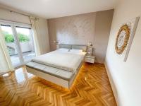 Posteľ alebo postele v izbe v ubytovaní Apartment in Crikvenica 42248