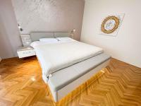 Posteľ alebo postele v izbe v ubytovaní Apartment in Crikvenica 42248