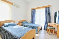 Postel nebo postele na pokoji v ubytování Lemon Grove Villa Dio