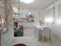 A seating area at Rami di Corallo Appartamento con Parcheggio Privato ----------