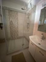 A bathroom at Bella apartman