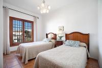 A bed or beds in a room at Caracola Apartment