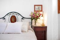 A bed or beds in a room at Caracola Apartment