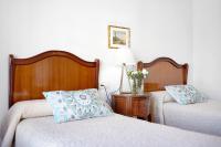 A bed or beds in a room at Caracola Apartment