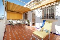 A seating area at Caracola Apartment