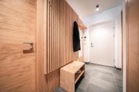 Televízia a/alebo spoločenská miestnosť v ubytovaní Das Conrad by Schladming-Appartements