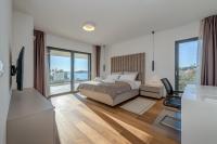Posteľ alebo postele v izbe v ubytovaní Sea Bliss Luxury Villa - Sevid
