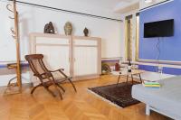 Televízia a/alebo spoločenská miestnosť v ubytovaní Monti Art Déco - design apartment