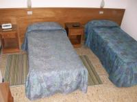 Posteľ alebo postele v izbe v ubytovaní HOTEL SANTOROTTO di FABIO TERROSI