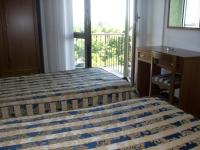 Posteľ alebo postele v izbe v ubytovaní HOTEL SANTOROTTO di FABIO TERROSI