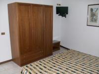 Posteľ alebo postele v izbe v ubytovaní HOTEL SANTOROTTO di FABIO TERROSI
