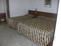 Posteľ alebo postele v izbe v ubytovaní HOTEL SANTOROTTO di FABIO TERROSI