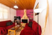 Televízia a/alebo spoločenská miestnosť v ubytovaní Serenity House