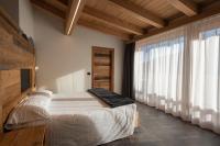 Posteľ alebo postele v izbe v ubytovaní Albergo Alpino