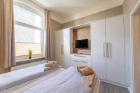 TV a/nebo společenská místnost v ubytování Haus Inselanker Kajüte 07